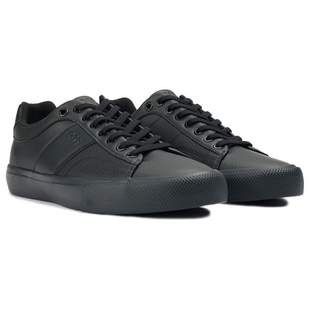 Show up in sleek style and comfort with the BOSS Aiden trainers. These black casual court shoes boast a high-quality leather-look upper, ensuring both durability and a luxe appearance. Underfoot, the robust rubber sole promises superb traction, ideal for urban adventures. The iconic BOSS branding adds a refined touch and designer recognition. Elevate your everyday ensemble with the sophistication of BOSS!