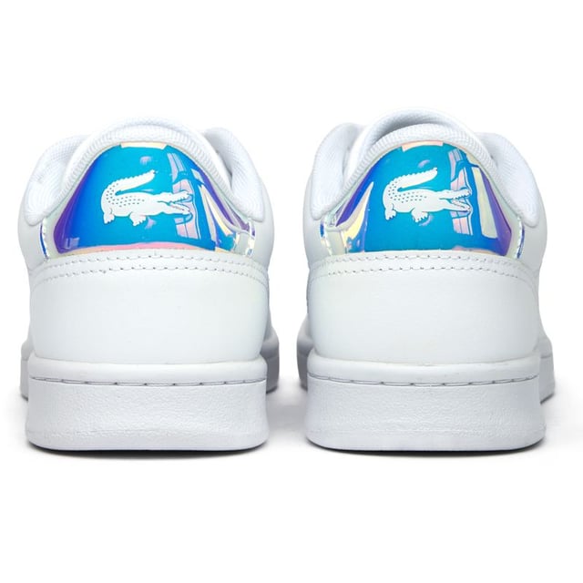 Lacoste Carnaby Set Trainers The Lacoste Carnaby Set offers timeless court-inspired elegance with a modern twist. These white leather trainers blend sophisticated style with practicality, supported by a durable rubber sole for all-day comfort. Subtle metallic accents elevate the classic design, while signature Lacoste branding on the tongue, heel, and quarter adds authentic heritage appeal. Perfect for casual outings or smart-casual occasions, these versatile women's trainers deliver the quality craftsmanship Lacoste is renowned for.