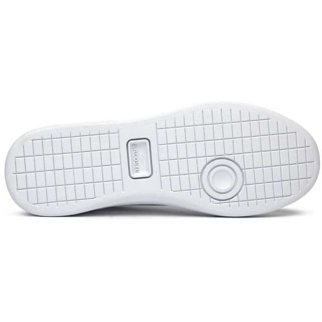 Lacoste Carnaby Set Trainers The Lacoste Carnaby Set offers timeless court-inspired elegance with a modern twist. These white leather trainers blend sophisticated style with practicality, supported by a durable rubber sole for all-day comfort. Subtle metallic accents elevate the classic design, while signature Lacoste branding on the tongue, heel, and quarter adds authentic heritage appeal. Perfect for casual outings or smart-casual occasions, these versatile women's trainers deliver the quality craftsmanship Lacoste is renowned for.