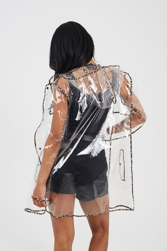Introducing the Brave Soul raincoat, the perfect addition to your outerwear collection. With bound seams, popper fastening, and functional pockets, this raincoat is both practical and stylish for the festival season ahead. The contrasting design completes the look, while the 100% EVA material ensures durability. Wipe clean for easy care. Stay stylish and dry in the rainy weather. Model wears S/M.