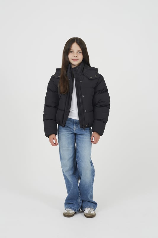 Designed for warmth and everyday functionality, this jacket from Ruby Tuesday by Brave Soul features all-over padding for reliable insulation and a fixed hood for added weather protection. Two lower pockets provide convenient storage, while elasticated cuffs and hem offer a secure and comfortable fit. Ideal for daily wear, whether heading to school or out and about. Model wears 9-10 years.