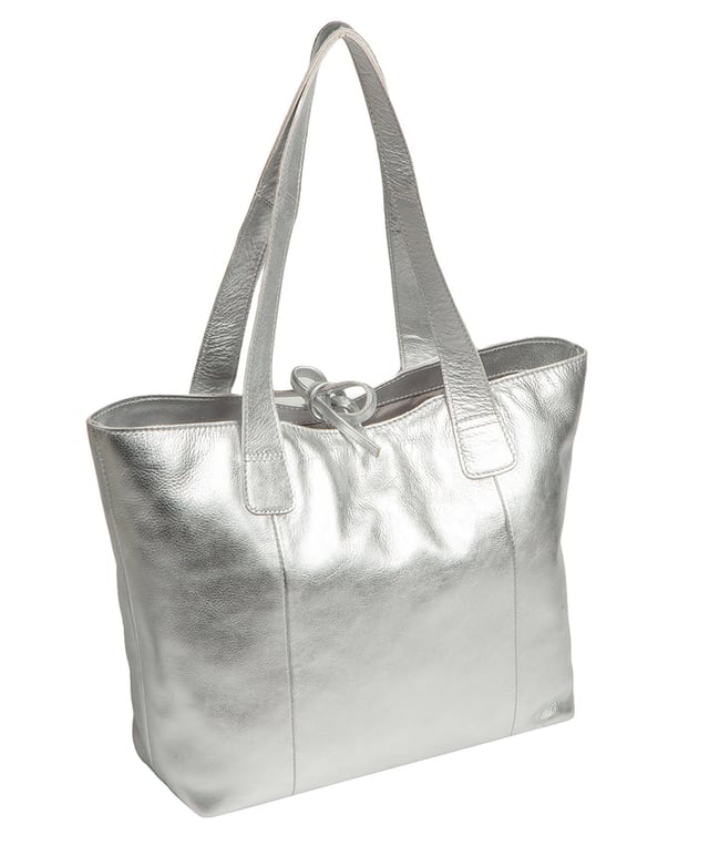 Handcrafted from natural leather with a soft to the touch pebble grain finish, the 'Carolina' tote bag from NiNa Amora is a must-have accessory. A unique tie top secures the central lined compartment which includes a zipped compartment which divides the design; perfect for maintaining an organised bag. Additional storage space is provided by a slip and zipped pocket on the interior, ideal for your phone, keys and any other essentials while out and about. Adorned with dual leather handles with a drop length of 25cm for a comfortable and versatile carrying options. Silver metal fittings and zips give this design a elegant look which is complemented the NiNa Amora X logo is silver foil embossed on the front and hanging charm for a luxurious finishing touch.