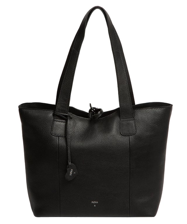 Handcrafted from natural leather with a soft to the touch pebble grain finish, the 'Carolina' tote bag from NiNa Amora is a must-have accessory. A unique tie top secures the central lined compartment which includes a zipped compartment which divides the design; perfect for maintaining an organised bag. Additional storage space is provided by a slip and zipped pocket on the interior, ideal for your phone, keys and any other essentials while out and about. Adorned with dual leather handles with a drop length of 25cm for a comfortable and versatile carrying options. Silver metal fittings and zips give this design a elegant look which is complemented the NiNa Amora X logo is silver foil embossed on the front and hanging charm for a luxurious finishing touch.