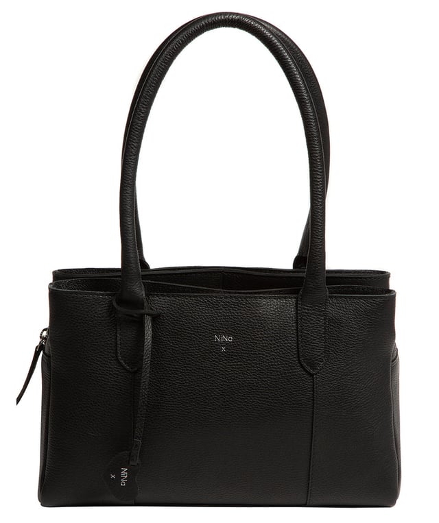 The 'Beatriz' handbag from NiNa Amora is crafted from natural leather with a soft to the touch pebble grain finish. This classic design is elevated thanks to the unique trio of main compartments. This comes in the form of a zipped central section with two magnetic press stud fastened slip pockets on either side; perfect for maintaining an organised accessory. Additional storage space is provided by slip pockets on the interior and exterior alongside a zipped pocket which lines the interior. Dual rounded leather handles adorn the bag with a drop length of 20cm. Silver coloured metal fittings and zips give this design a elegant look which pops against the leather exterior and complemented the NiNa Amora X logo which is silver foil embossed on the front and hanging charm for a luxurious finishing touch.