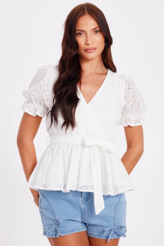 - Embroidered pattern - V neckline - Puff sleeves - Wrap style - Model height: 5'9" - Model wears uk 8 / us 4 / eur 36 - Always check the wash care label - Cool hand wash with mild detergent