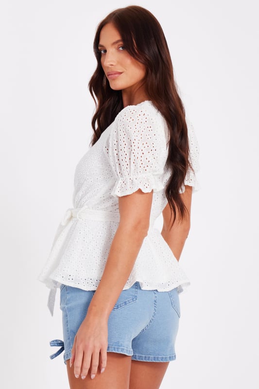 - Embroidered pattern - V neckline - Puff sleeves - Wrap style - Model height: 5'9" - Model wears uk 8 / us 4 / eur 36 - Always check the wash care label - Cool hand wash with mild detergent