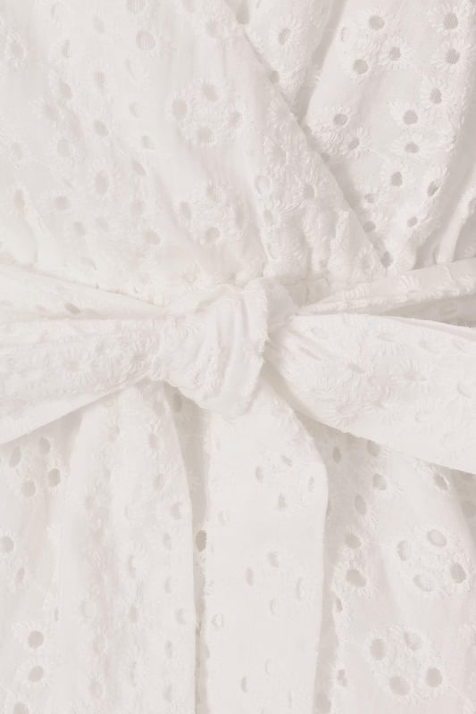 - Embroidered pattern - V neckline - Puff sleeves - Wrap style - Model height: 5'9" - Model wears uk 8 / us 4 / eur 36 - Always check the wash care label - Cool hand wash with mild detergent