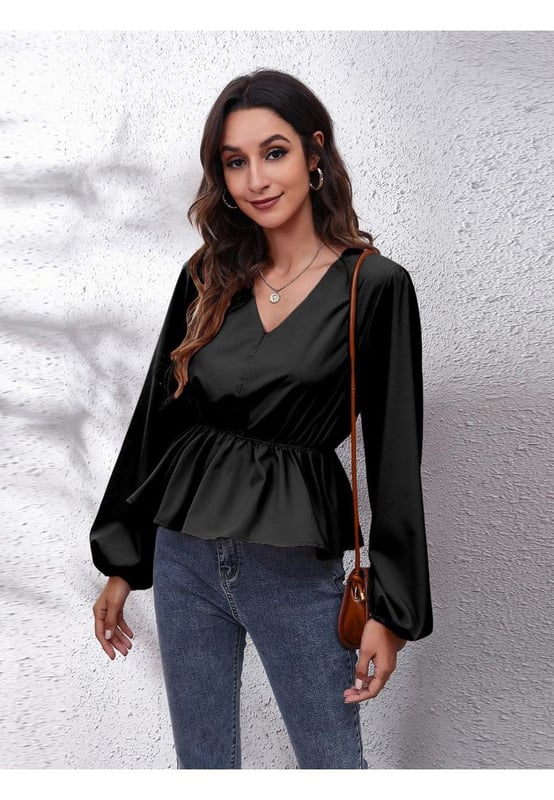 Basic style
  Opaque fabric
  No stretch
  100% polyester
  Machine wash cold
  Tumble dry low
  Imported
  Product measurements:
  S: bust 38.2 in shoulder 14.4 in sleeve length 25 in length 21.5 in
  M: bust 39.8 in shoulder 14.8 in sleeve length 25.4 in length 21.8 in
  L: bust 42.1 in shoulder 15.2 in sleeve length 25.7 in length 22.2 in
  XL: bust 44.5 in shoulder 15.6 in sleeve length 26.1 in length 22.6 in
Material: The material appears to be a lightweight possibly cotton or polyester blend giving it a smooth texture.  The design includes a peplum waistline and long balloon sleeves.
