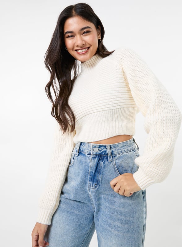 Get cosy this season with this winter weather warmer! Our High Neck Knitted Jumper is the perfect addition to any outfit. Pair with jeans and trainers for the ultimate look.