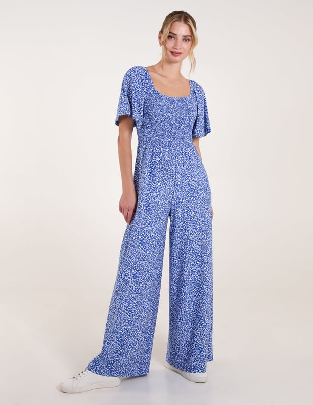 The jumpsuit everyone will be jumping into this season! This cute ditsy print all in one is a must have!