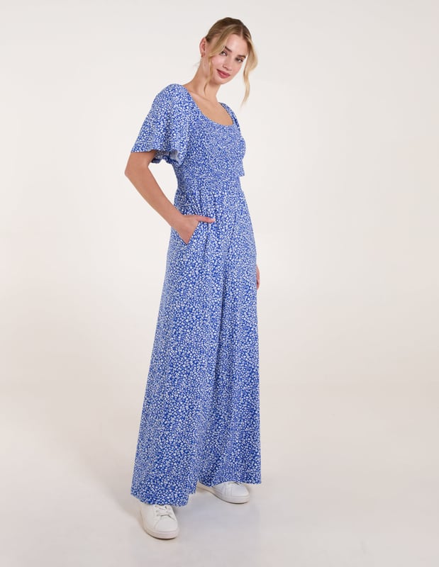 The jumpsuit everyone will be jumping into this season! This cute ditsy print all in one is a must have!