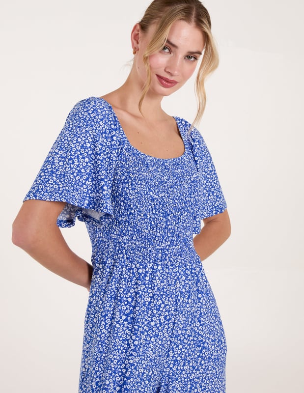 The jumpsuit everyone will be jumping into this season! This cute ditsy print all in one is a must have!