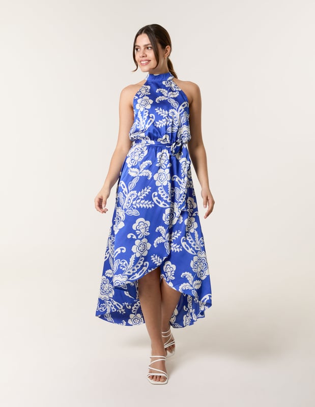 This midi dress is a must-have for special occasions, with it's elegant neckline, satin finish, and wrap front. Team with white heels and silver accessories.     