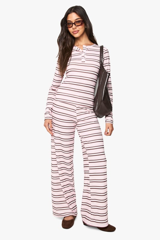 Stripe Long Sleeve Button Down Top Steal the style top spot in a statement separate from the tops collectionCamis or crops, bandeaus or bralets, we've got all the trend-setting tops so you can stay statement in separates this season. Hit refresh on your jersey basics with pastel hues and pick a quirky kimono to give your ensemble that Eastern-inspired edge. Off the shoulder styles are oh-so-sweet, with slogans making your tee a talking point.