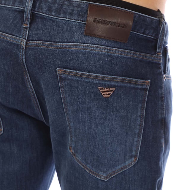 Mens Emporio Armani J06 Slim-Fit Jeans in blue.- Five-pocket styling.- Zip fly and button fastening.- Belt loops.- Leather brand patch.- Slim fit.- 98% Cotton  2% Elastane.- Ref: EM000121AMB002