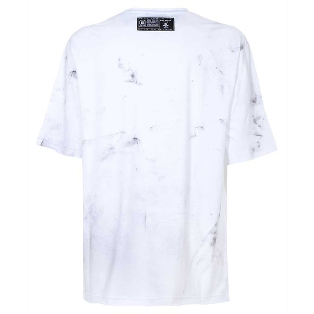 Balmain Sketch Drawing Logo White T-shirt Elevate your wardrobe with the Balmain Sketch Drawing Logo White T-Shirt, a refined piece crafted in Italy from 100% premium cotton for exceptional comfort and durability. Featuring Balmain's distinctive sketch drawing logo, this white t-shirt blends artistic flair with timeless style. Its breathable fabric ensures all-day ease, making it perfect for both casual outings and sophisticated layering. Designed for the modern man who values quality and elegance, this t-shirt offers a versatile addition to any collection, promising a sleek, polished look every time you wear it. Experience luxury and creativity in one essential garment