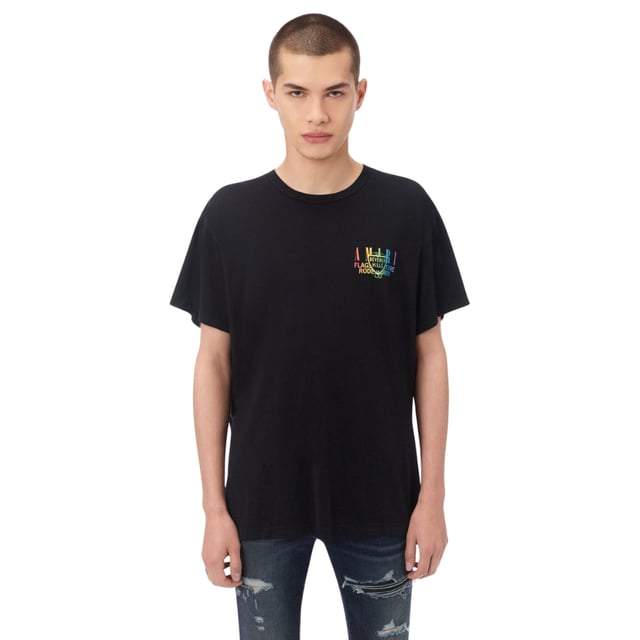 Elevate your wardrobe with the Amiri XO Beverly Hills Black T-Shirt, crafted from 100% premium cotton for exceptional comfort and durability. Made in the USA, this t-shirt combines high-quality materials with expert craftsmanship, ensuring a perfect fit and lasting wear. Its sleek black design and iconic Amiri XO branding make it a versatile piece that effortlessly enhances any casual or streetwear look. Experience the blend of style and comfort that defines luxury with this standout t-shirt, designed for those who appreciate both fashion and quality