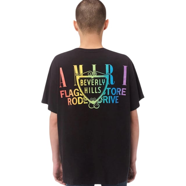 Elevate your wardrobe with the Amiri XO Beverly Hills Black T-Shirt, crafted from 100% premium cotton for exceptional comfort and durability. Made in the USA, this t-shirt combines high-quality materials with expert craftsmanship, ensuring a perfect fit and lasting wear. Its sleek black design and iconic Amiri XO branding make it a versatile piece that effortlessly enhances any casual or streetwear look. Experience the blend of style and comfort that defines luxury with this standout t-shirt, designed for those who appreciate both fashion and quality
