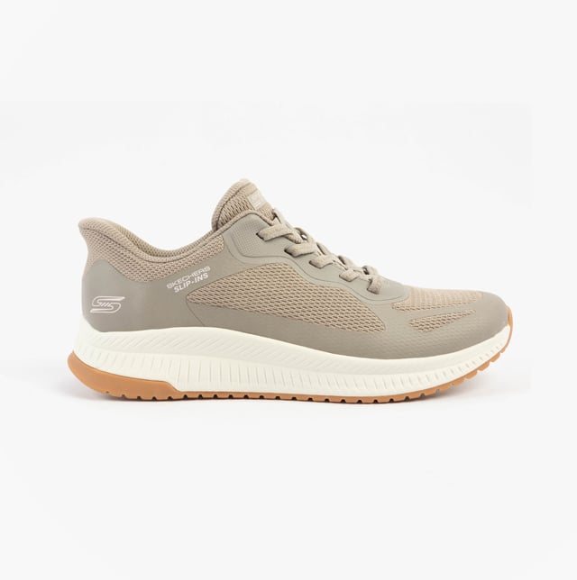 This women's fitness trainer features a synthetic and mesh upper with air-cooled memory foam for comfort. The low-top design with a rubber sole offers relaxed fit and easy slip-in wear