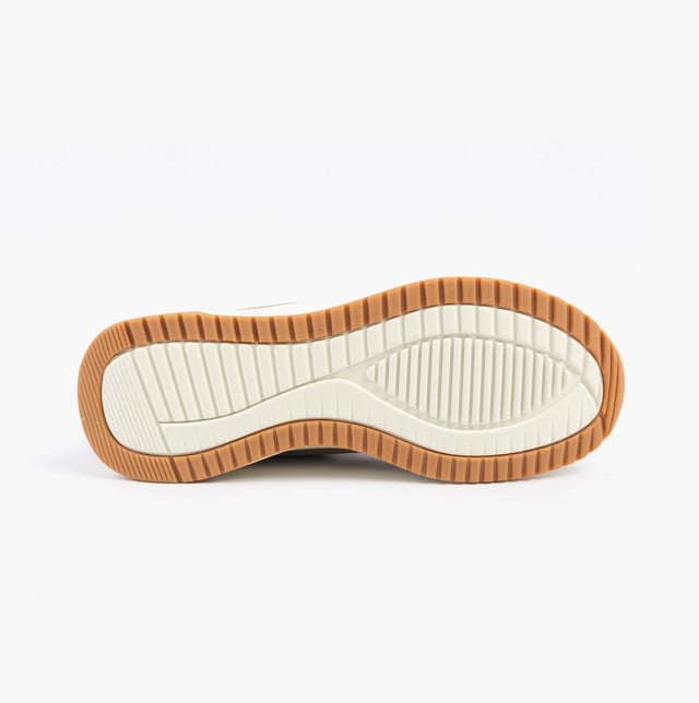 This women's fitness trainer features a synthetic and mesh upper with air-cooled memory foam for comfort. The low-top design with a rubber sole offers relaxed fit and easy slip-in wear