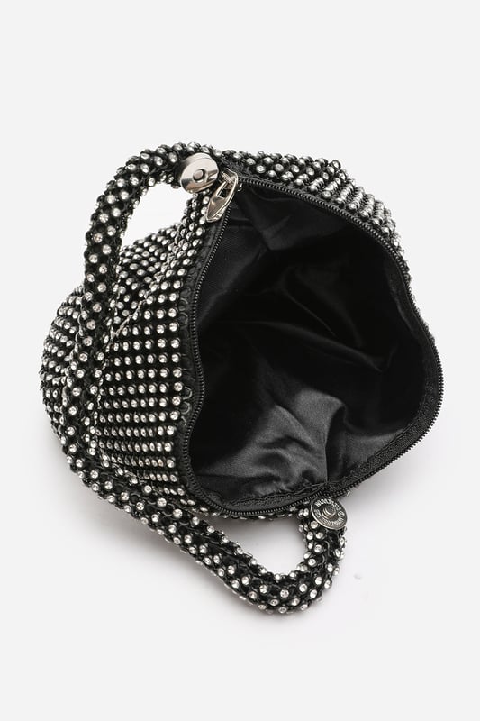 Add sparkle to your night with this Cascabel mini chainmail pouch bag, designed to dazzle at parties, weddings, or festive occasions. Its compact silhouette features shimmering crystal-style embellishments and a stylish knotted wristlet strap for easy carrying. Lightweight yet eye-catching, it's the perfect accessory for carrying your small essentials in glamorous style. A chic statement piece that blends retro charm with modern flair. Key Features: • Material: Rhinestone-embellished chainmail mesh • Dimensions: 16cm (L) x 14cm (H) x 10cm (W) • Fastening: Hidden zip closure at the top • Detail: Knotted wristlet strap for a secure and stylish hold