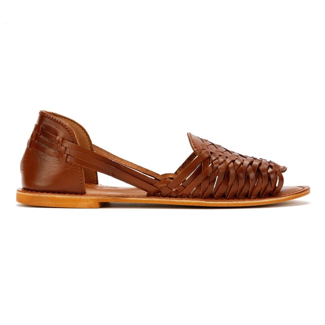 Step into timeless style with these women's huarache sandals. Featuring a genuine leather upper with a classic handwoven design, these sandals offer breathable comfort and easy slip-on. Perfect for warm-weather wear, ideal for casual outings, vacations, or everyday summer style.