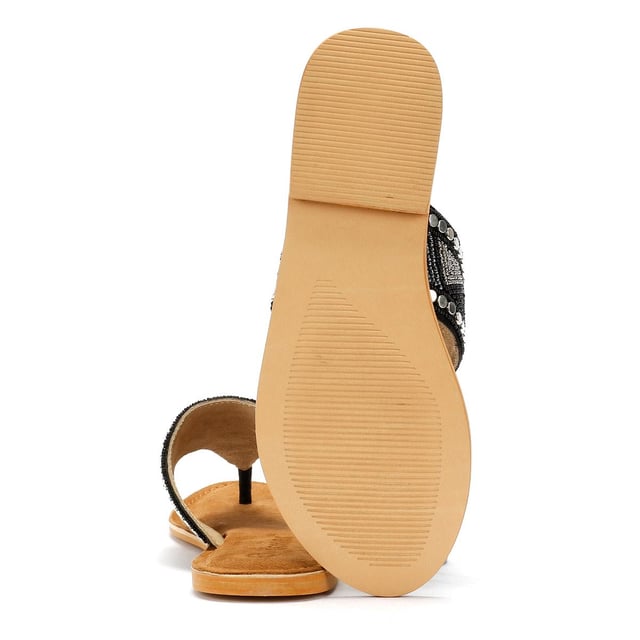 Stap in zomerse stijl met deze dames sandalen met wijde vampier en kralen. Met een modieuze brede vampierband versierd met ingewikkelde kralen, bieden deze platte sandalen een veilige pasvorm en een chique, boho-geïnspireerde uitstraling. Het klassieke teenpost-ontwerp zorgt voor gemakkelijk aan- en uittrekken, waardoor ze perfect zijn voor stranddagen, informele uitstapjes of vakanties.