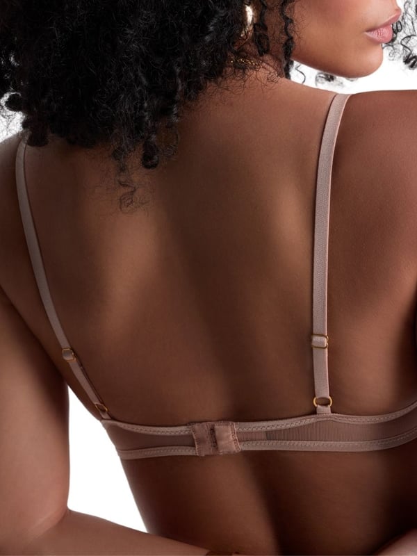 Aubade Sound of Heart Half Cup Bra. Underwired demi bra with a cleavage enhancing neckline, double strap detail, shimmering multi-tone embroidery and lurex thread running through. Matching briefs available. This item is recommended for hand wash only.