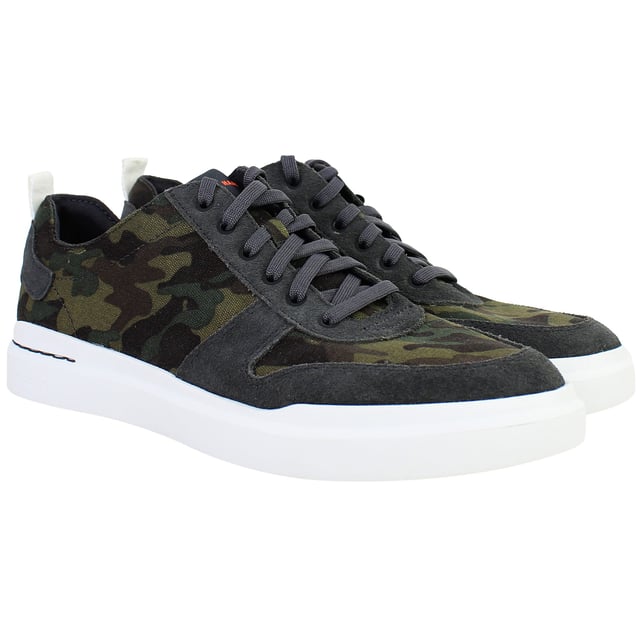 Bold yet refined, the Cole Haan GrandPrø Rally Men’s Trainers in Camo Green fuse athletic performance with elevated street style. With lightweight construction, cushioned comfort, and a distinctive camouflage print, these trainers are made for men who move confidently between work, play, and everything in between.
Key Features
Lightweight EVA Midsole

Engineered for soft, responsive cushioning and a featherlight feel ideal for all-day wear.

Classic Low-Top Sneaker Silhouette

Inspired by court heritage with a clean, modern twist that fits seamlessly into casual or smart-casual wardrobes.

Ortholite® Footbed

Provides moisture-wicking, breathable support and long-lasting underfoot comfort.

Durable Rubber Outsole with Traction Pods

Delivers stability, grip, and flexibility for versatile movement across everyday surfaces.

Secure Lace-Up Closure

Offers a snug, adjustable fit while maintaining a streamlined look.

Padded Collar and Tongue

Enhance ankle comfort and support, whether you’re on the move or on your feet all day.

Camo Green Colourway

Subtle yet statement-making—pairs easily with denim, joggers, or tapered trousers.


From city streets to casual weekends, the Cole Haan GrandPrø Rally Men’s Camo Green Trainers deliver modern comfort and confident style—crafted for everyday versatility with a bold edge.