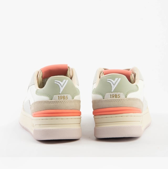 These casual women's trainers feature a leather and suede upper with breathable textile lining, rubber sole, and a low heel, ideal for comfortable everyday wear