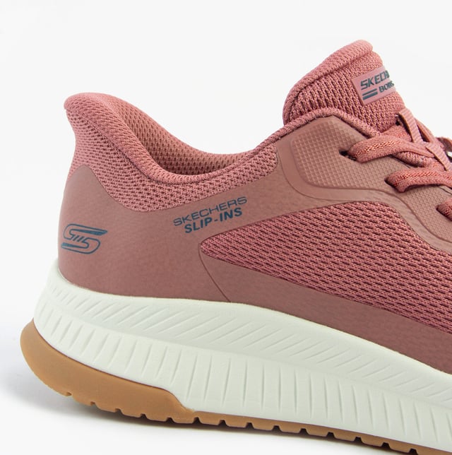 The Skechers BOBS SQUAD 4 trainers feature a synthetic and mesh upper with air-cooled memory foam for comfort. Designed for casual fitness, they have a low-top style with a rubber sole and lace-up closure