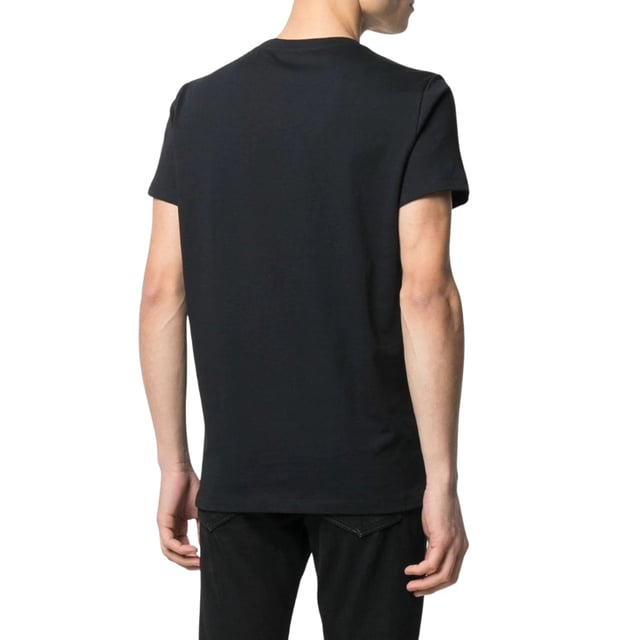 Elevate your wardrobe with the Balmain Paris Rainbow Multi Logo Black T-Shirt, a striking blend of luxury and casual style. Crafted from 100% premium cotton in Portugal, this black tee offers exceptional comfort and durability. The vibrant rainbow multi-logo design adds a bold, contemporary edge, making it perfect for those who want to stand out effortlessly. Whether paired with jeans or layered under a jacket, this Balmain T-shirt brings a touch of Parisian sophistication to your everyday look. Experience the perfect fusion of quality and fashion with this must-have piece