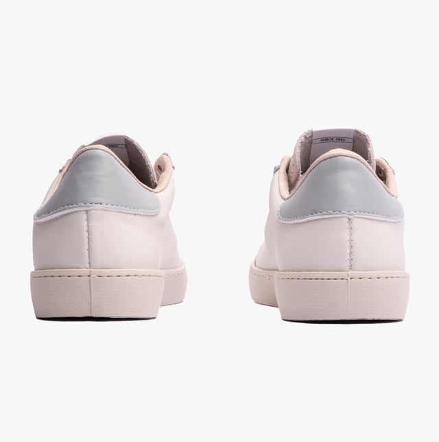 Faux leather casual trainers feature a low-top design with textile lining, PVC sole, lace-up closure, and a round toe, offering comfort for everyday wear