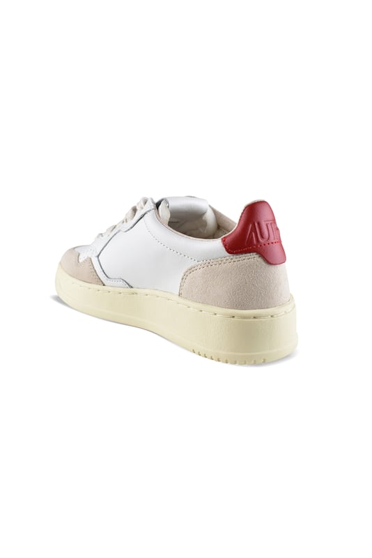 Zapatillas bajas Autry de piel blanca y ante beige.Parche del logotipo en el exterior. Parte superior de piel naranja con logotipo en relieve.Lengüeta con parche del logotipo.Suela de goma con efecto amarilleado. Cierre con cordones. Puntera redonda perforada.100% piel.