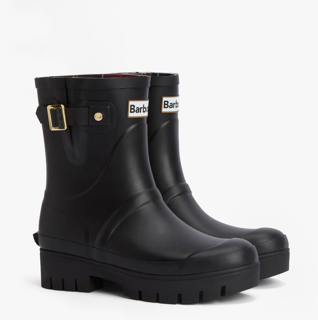 Diese wasserfesten Gummistiefel in knöchelhöhe verfügen über ein Obermaterial aus Gummi, eine Gummisohle, ein Polyesterfutter und einen Blockabsatz, ideal für lässige Outfits und einfachen Tragekomfort.
