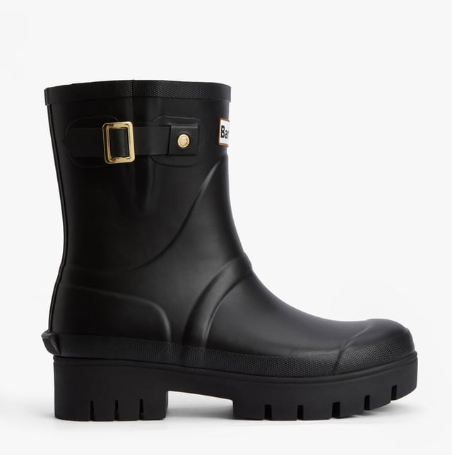Diese wasserfesten Gummistiefel in knöchelhöhe verfügen über ein Obermaterial aus Gummi, eine Gummisohle, ein Polyesterfutter und einen Blockabsatz, ideal für lässige Outfits und einfachen Tragekomfort.