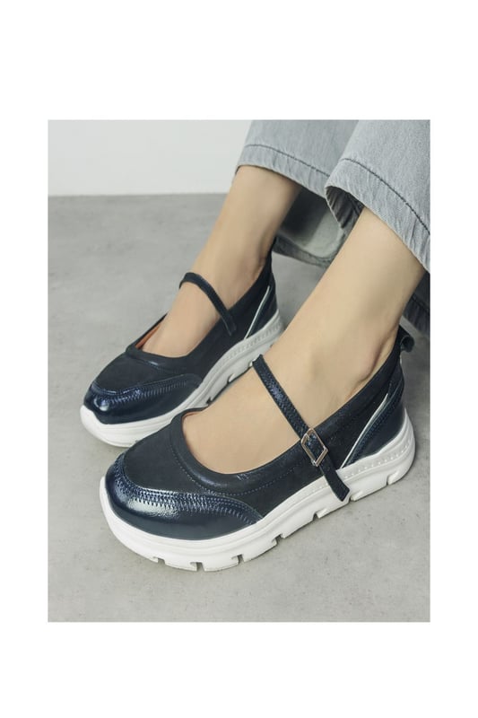 Discover Enchant, hybrid style Mary Jane. This style features a classic Mary Jane silhouette, with a strap for a secure fit, on a sporty sole making it ideal for when you're on the go. The cushioned sole provides comfortable wear.