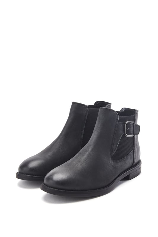 Put your best foot forward in Bryana, the leather flat ankle boot. This style features a buckle design with an elastic panel for easy foot entry. Bryana is the wardrobe essential must-have for this season.