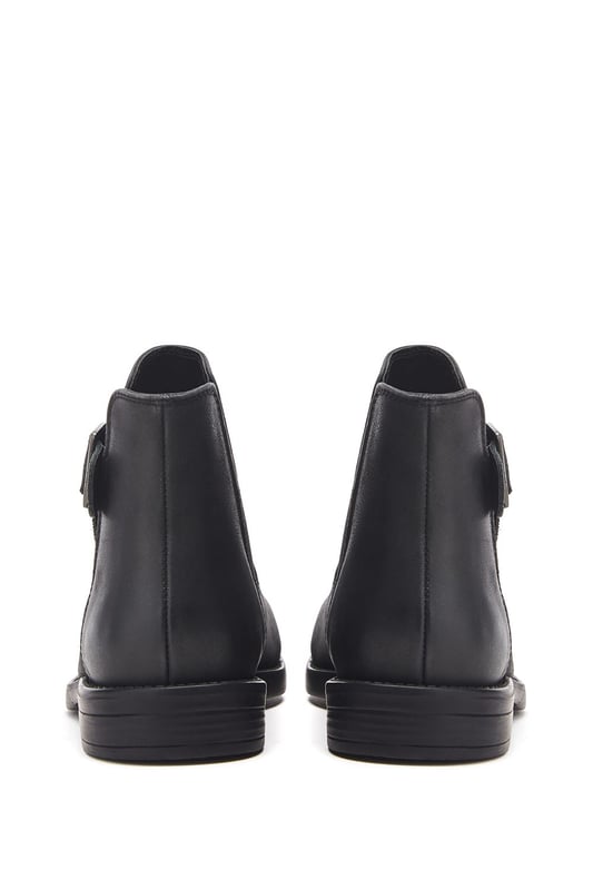 Put your best foot forward in Bryana, the leather flat ankle boot. This style features a buckle design with an elastic panel for easy foot entry. Bryana is the wardrobe essential must-have for this season.