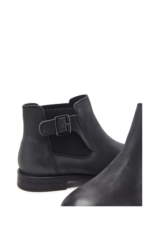 Put your best foot forward in Bryana, the leather flat ankle boot. This style features a buckle design with an elastic panel for easy foot entry. Bryana is the wardrobe essential must-have for this season.