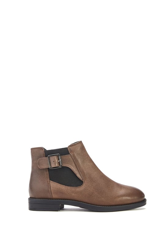 Put your best foot forward in Bryana, the leather flat ankle boot. This style features a buckle design with an elastic panel for easy foot entry. Bryana is the wardrobe essential must-have for this season.