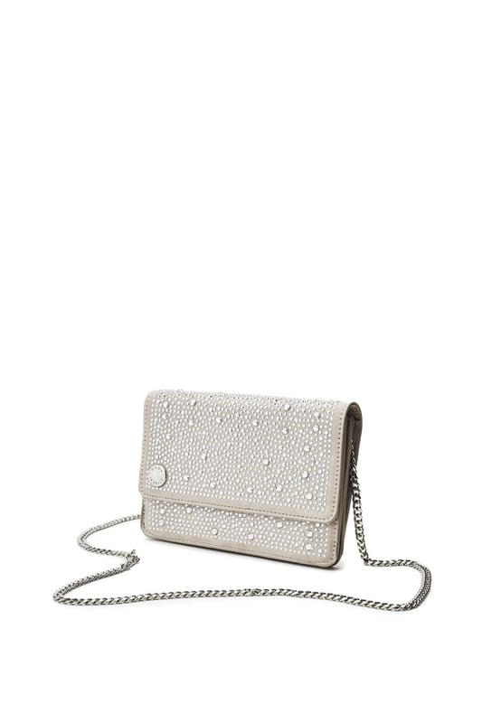 Meet the perfect match with Christiie bag which can be matched effortlessly with our Christiie shoes. This clutch features external hotfix gems with 2 main internal compartments and a built in mirror. The metal chain strap can be wrapped around the flap to shorten to suit your style. Complete with satin lining for a super luxurious feel.