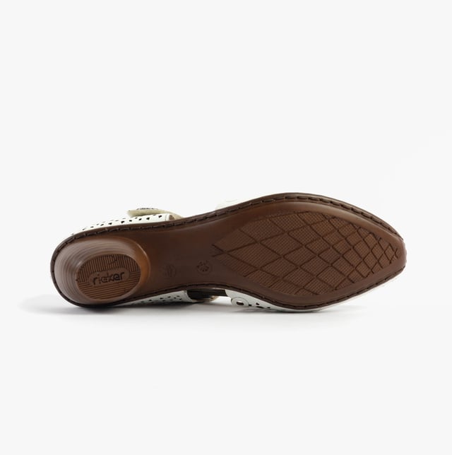 Rieker 43753-80 Womens Shoes White These Mary Jane shoes feature coated leather uppers, synthetic lining, a breathable design, and a low block heel, ideal for casual wear and all-day comfort