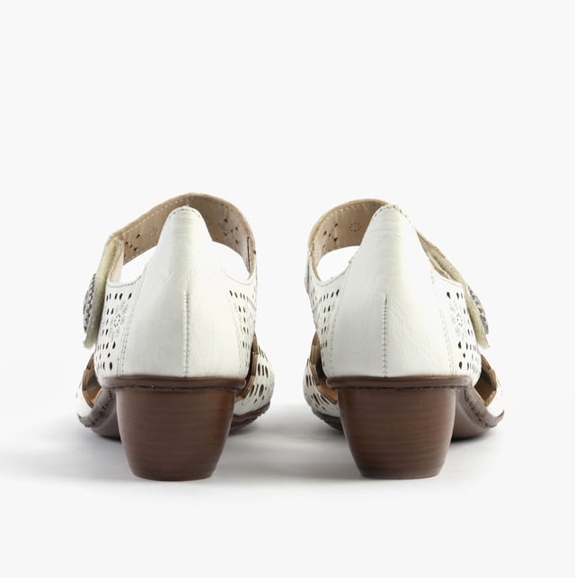 Rieker 43753-80 Womens Shoes White These Mary Jane shoes feature coated leather uppers, synthetic lining, a breathable design, and a low block heel, ideal for casual wear and all-day comfort