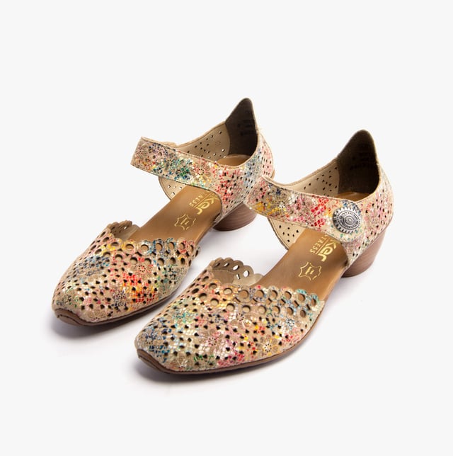 These Mary Jane shoes feature coated leather, synthetic lining, and a RIRICON sole with a low block heel. Designed for comfort and breathability, ideal for casual wear