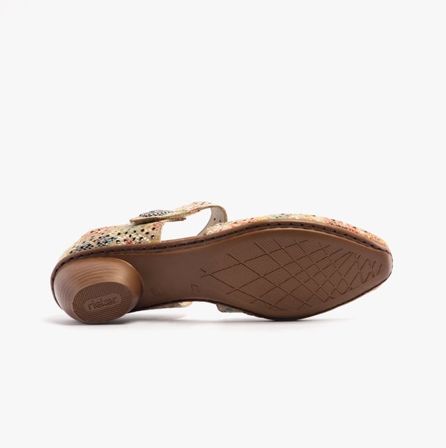 These Mary Jane shoes feature coated leather, synthetic lining, and a RIRICON sole with a low block heel. Designed for comfort and breathability, ideal for casual wear