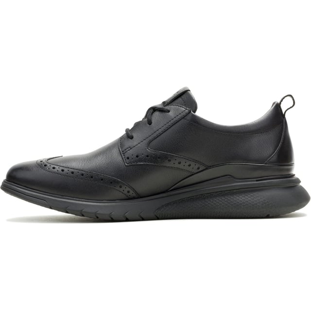 Hush Puppies Advance Leder Herrenschuhe In Schwarz/Schwarz Mit Schnürung Mit unserer berüchtigten Bounce-Innensohle konstruiert, bietet der Advance Wingtip extreme Dämpfung und gibt bei jedem Schritt Energie zurück. Neben seiner stilvollen Form töten die antimikrobiellen Futterstoffe im Schuh Mikroben bei Kontakt.