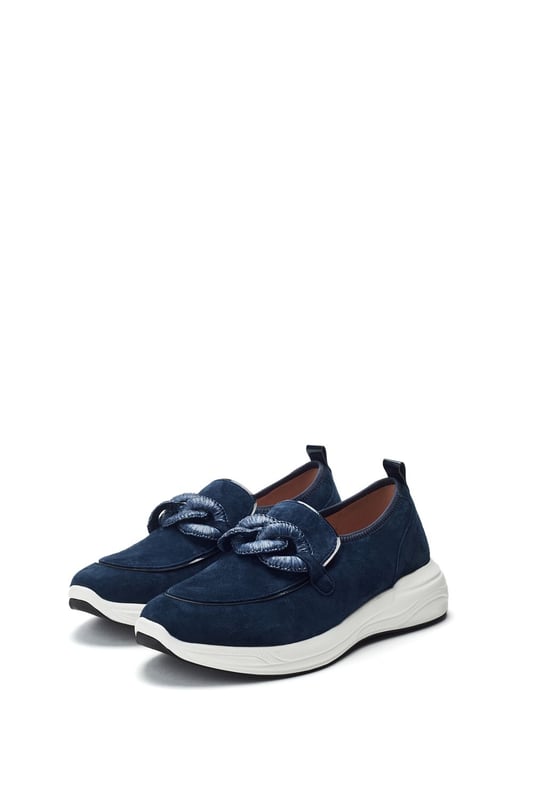 Put your best foot forward in Basil, the sporty slip-on shoe with chunky chain embellishments. This style features a sporty sole with padded arch support and leather sock for ultra-comfortable wear. The elastic gusset ensures effortless foot entry and a secure fit.