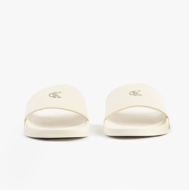 These women's sliders feature a cotton upper, polyester lining, and lightweight EVA sole. Designed for comfort and casual wear, they are slip-on with a flat heel for easy all-day use