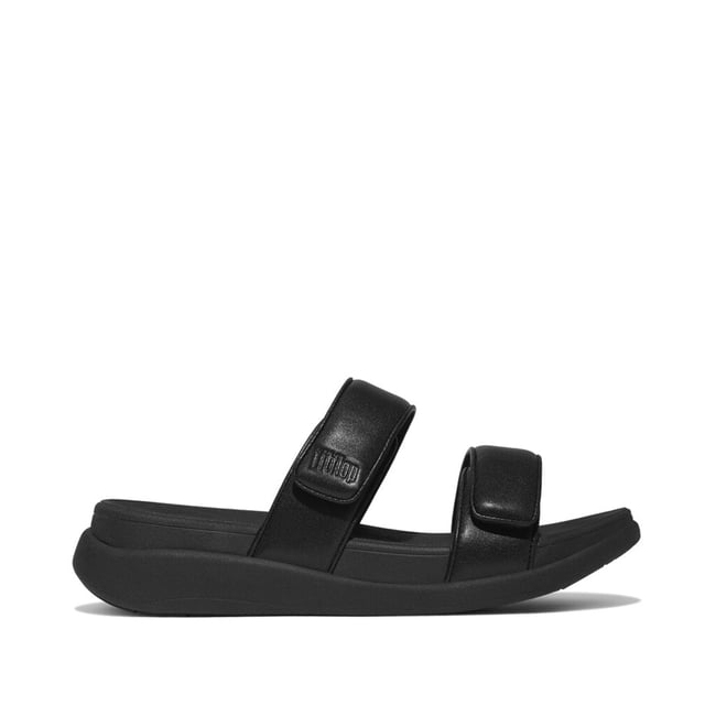 These slip-on women's slides feature a leather upper and lining, EVA sole, and wedge heel for comfort and breathability, ideal for casual wear